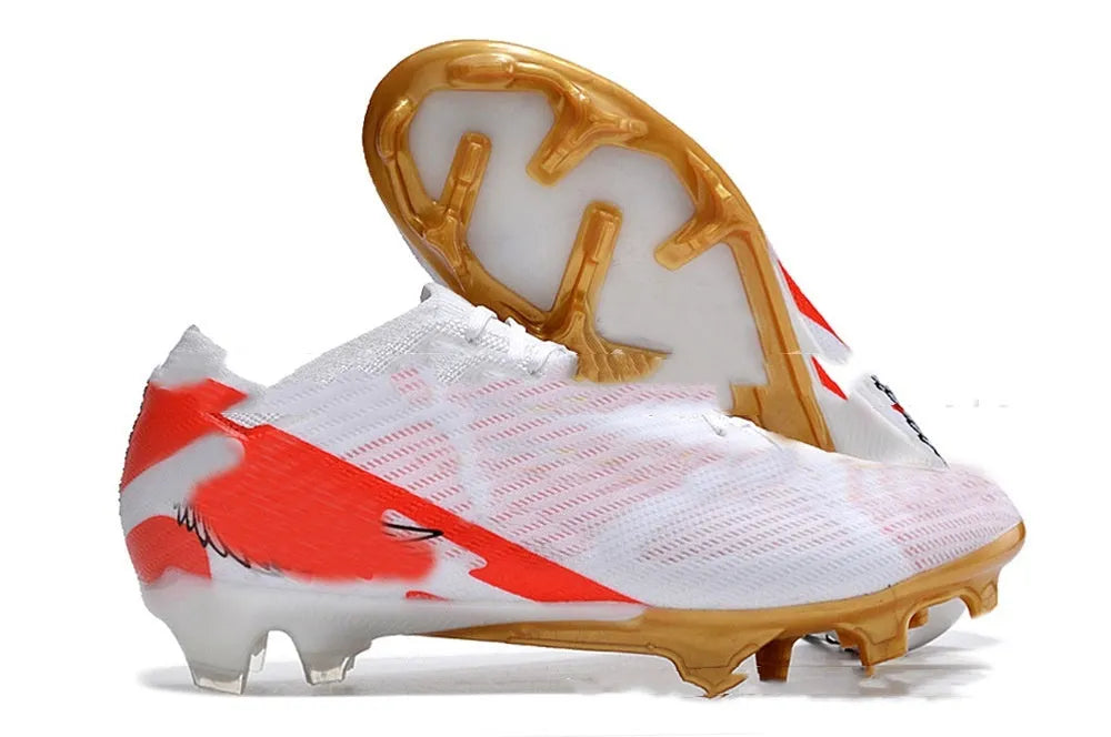 Men's black football shoes with FG studs, knitted upper, and lace-up closure on grass pitch