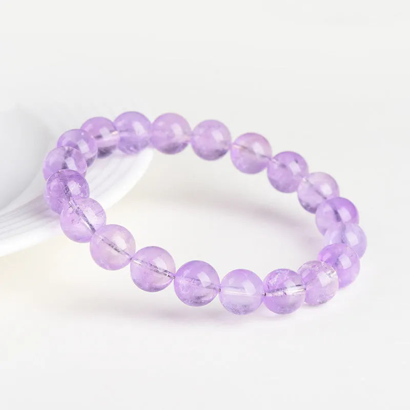 Lavender amethyst round bead bracelet with water ripple pattern showing cream and transparent colour options