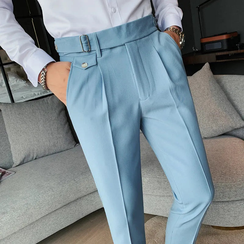 Men's straight leg casual trousers in solid colours including black and grey on a hanger.