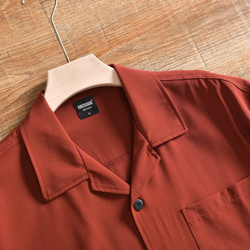 Men's loose-fit lightweight short sleeve shirt in solid colour, shown in Army Green.