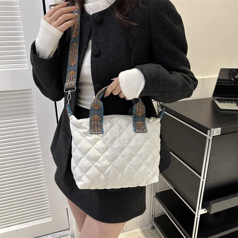 Soft Oxford cloth messenger bag with embroidery details and internal phone pocket in horizontal square shape