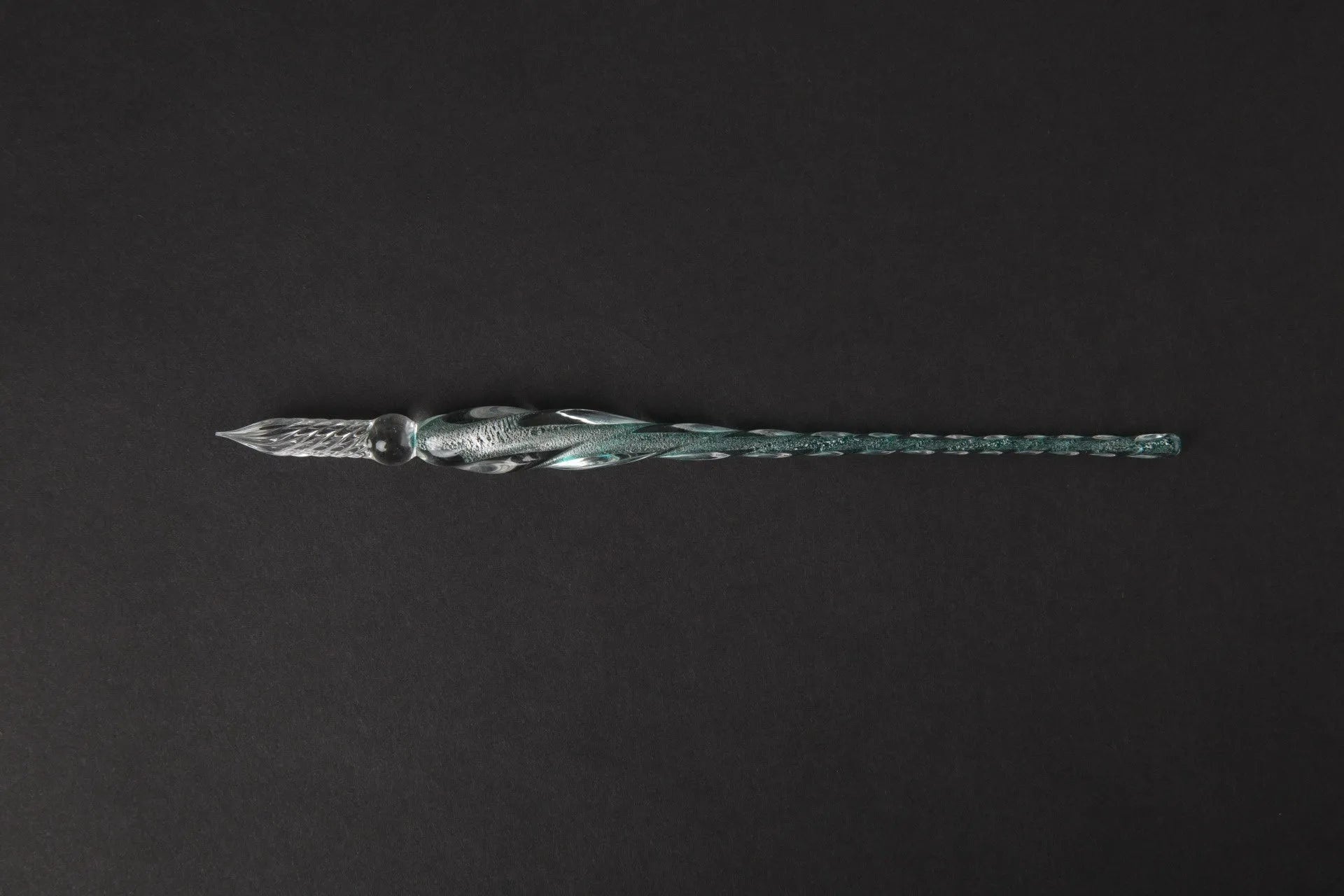 Transparent coloured glass crystal pen with water art ink in gift box, shown in multiple colour options.