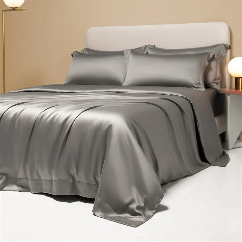 Lenzing Tencel 200 thread count bedding set in satin weave showing Aurora Blue quilt cover and pillowcases