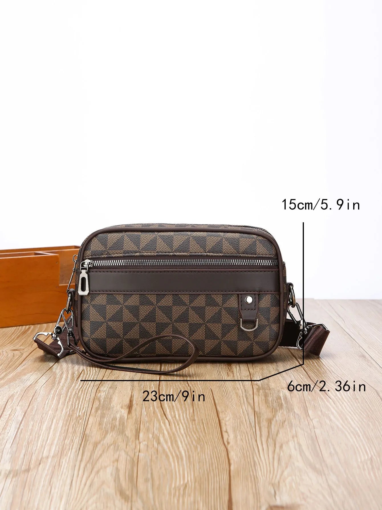 Men's geometric pattern PU messenger bag shown in a horizontal carry position.