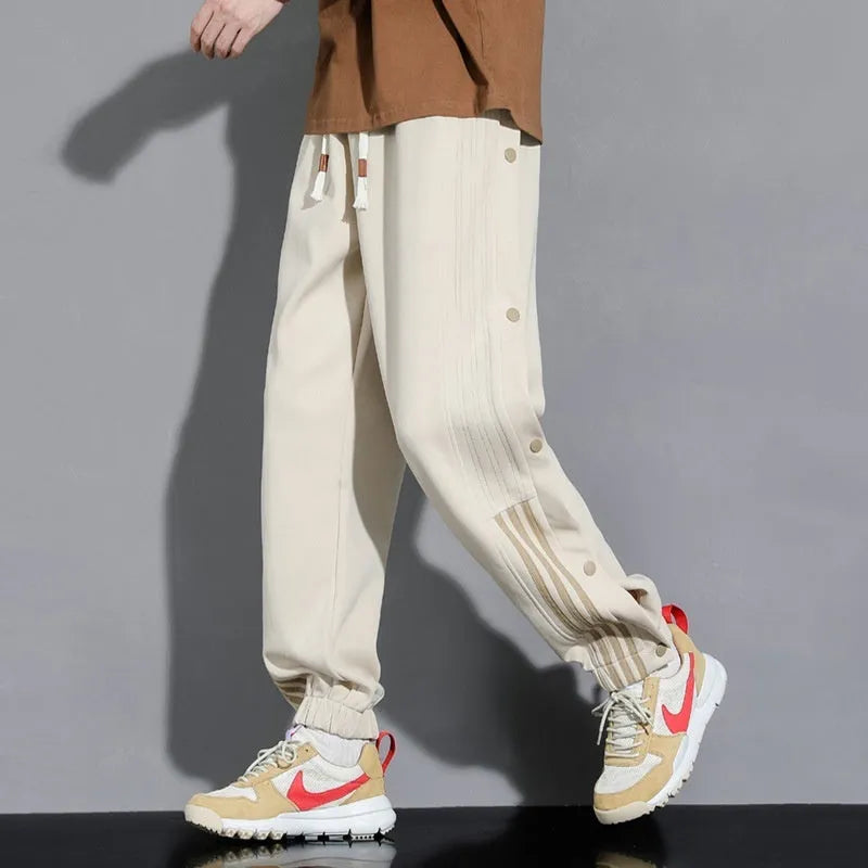 Men's loose-fit sportswear trousers with ankle tie detail in cotton blend fabric