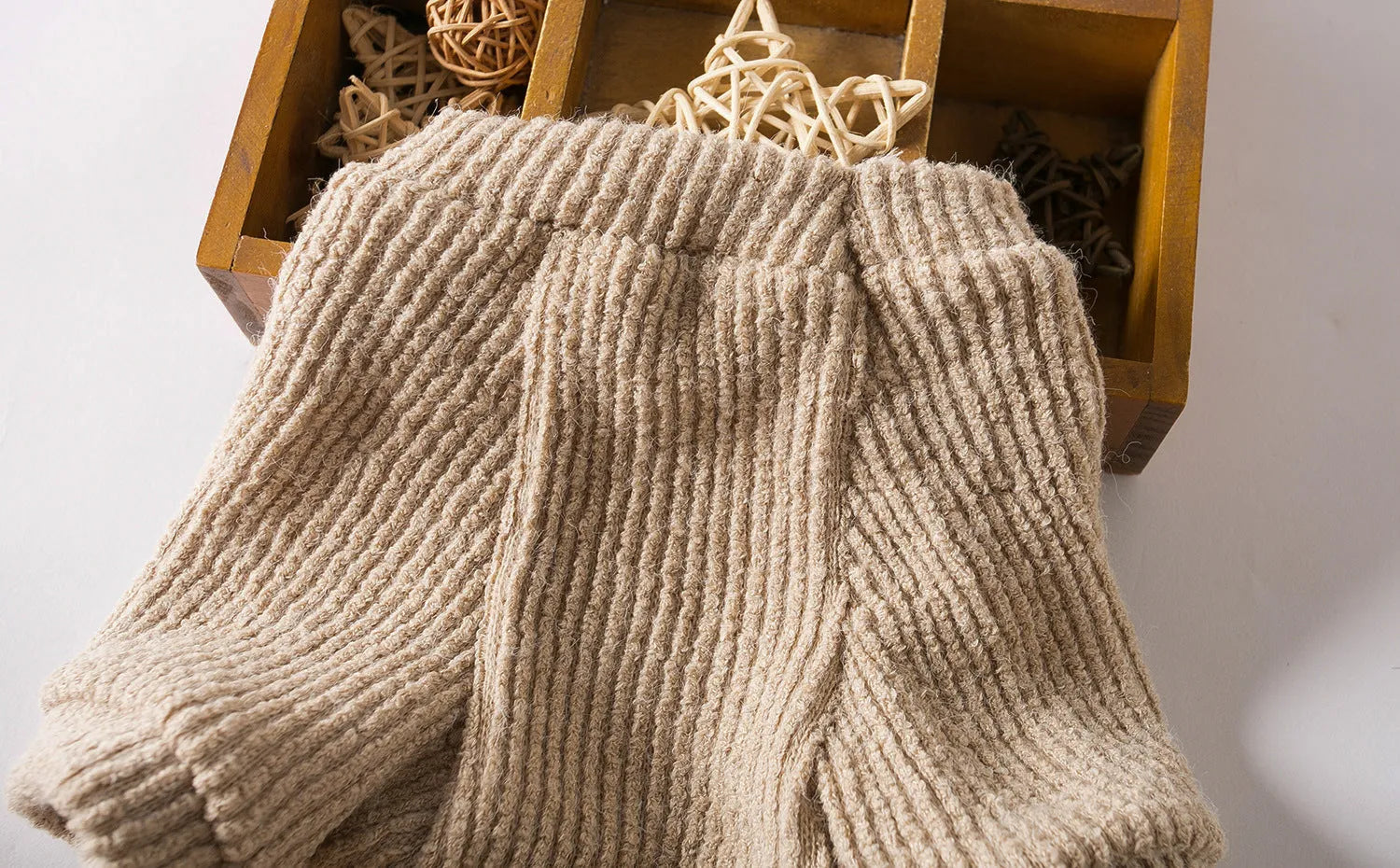 Brown cloth dog sweater pullover on a small dog, showing casual style.