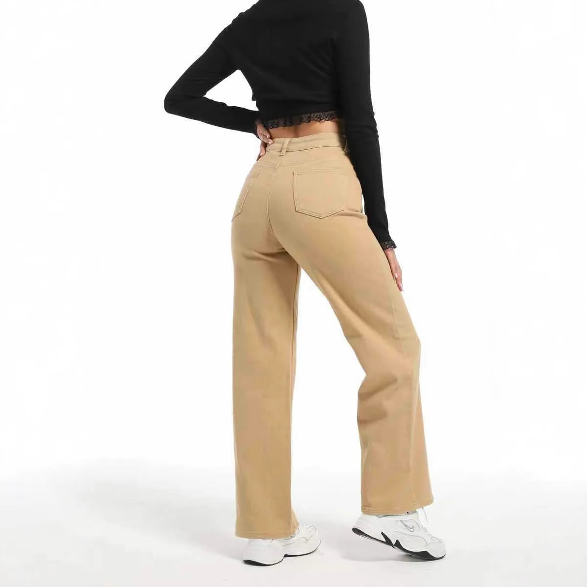 Women's high-waist straight-leg cotton jeans in apricot and khaki colours on a hanger.