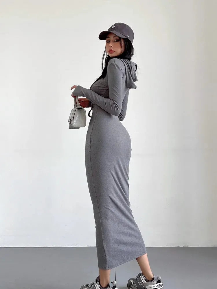 Women's grey hooded long sleeve sheath dress with high waist on a mannequin.