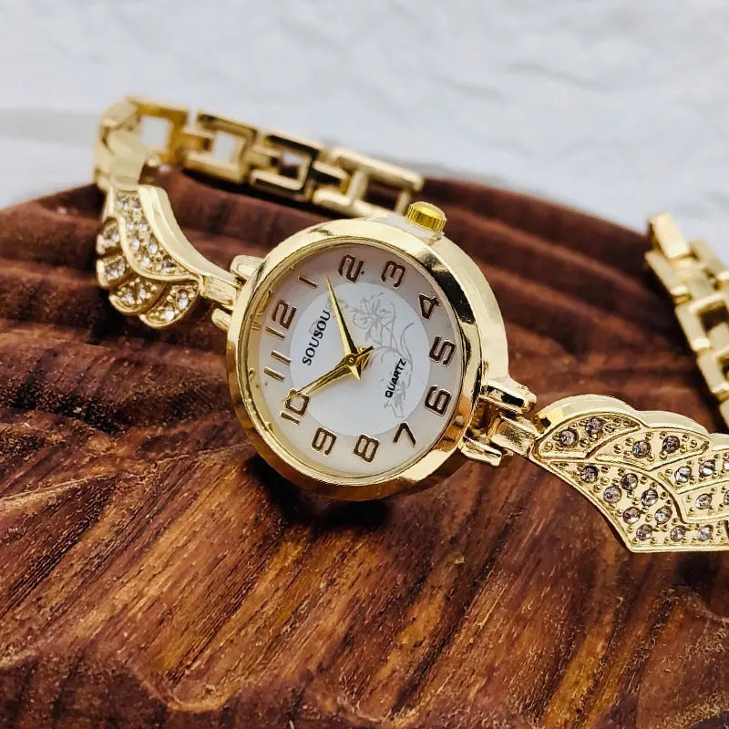 Stainless steel women's watch with round dial and Vachette clasp, shown in gold surface colour option
