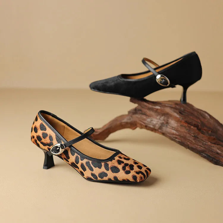 Women's black square toe stiletto heels with horse hair upper and ankle strap buckle.
