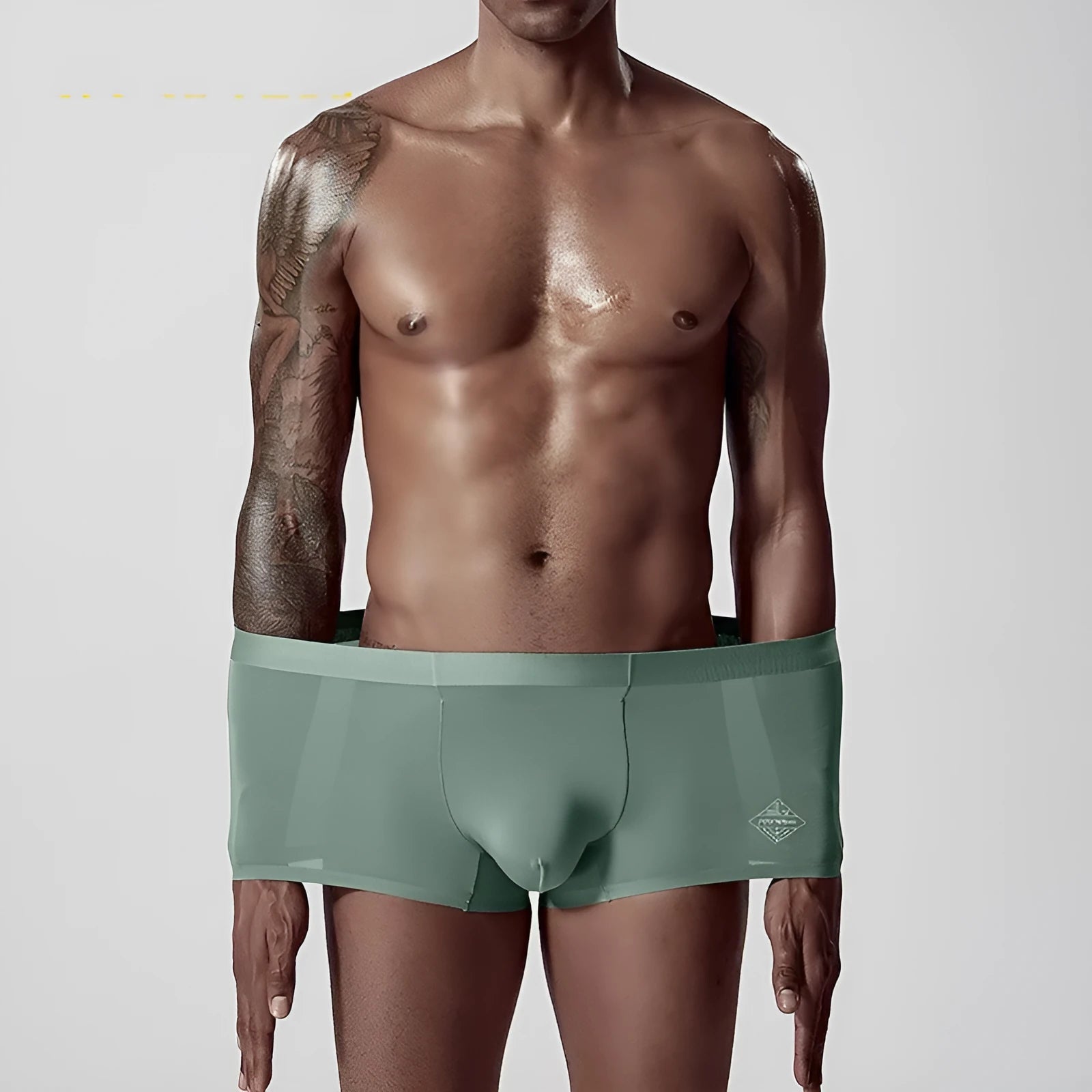 Men's seamless modal underwear in mid waist style showing hip lifting and body shaping design