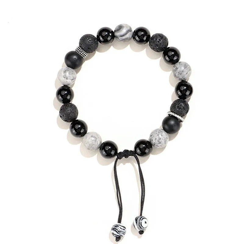 Black agate map stone volcanic rock bracelet with diamond-shaped beads and electroplated metal fittings