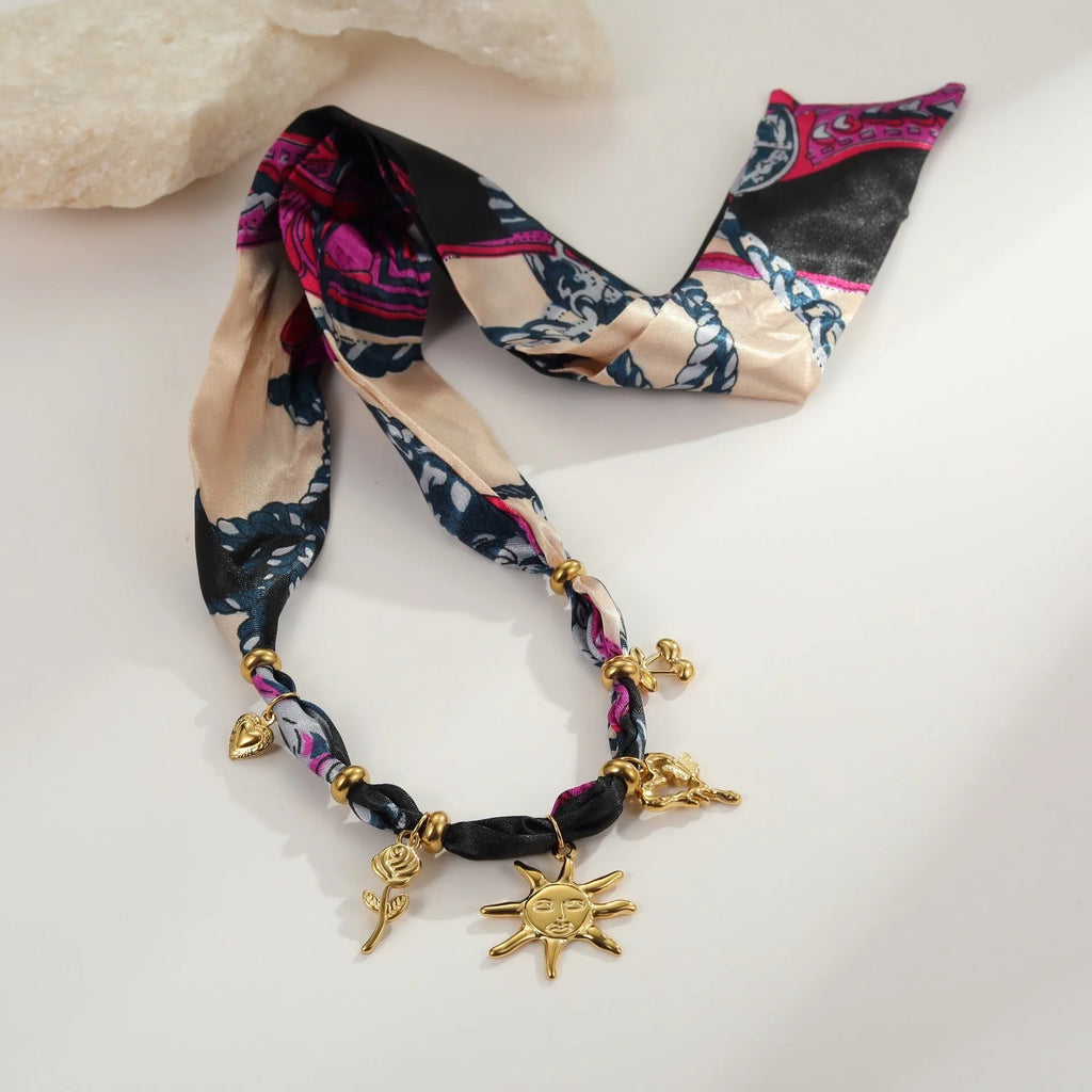Geometric sun pendant necklace or bracelet in stainless steel with 18K electroplating for autumn winter fashion