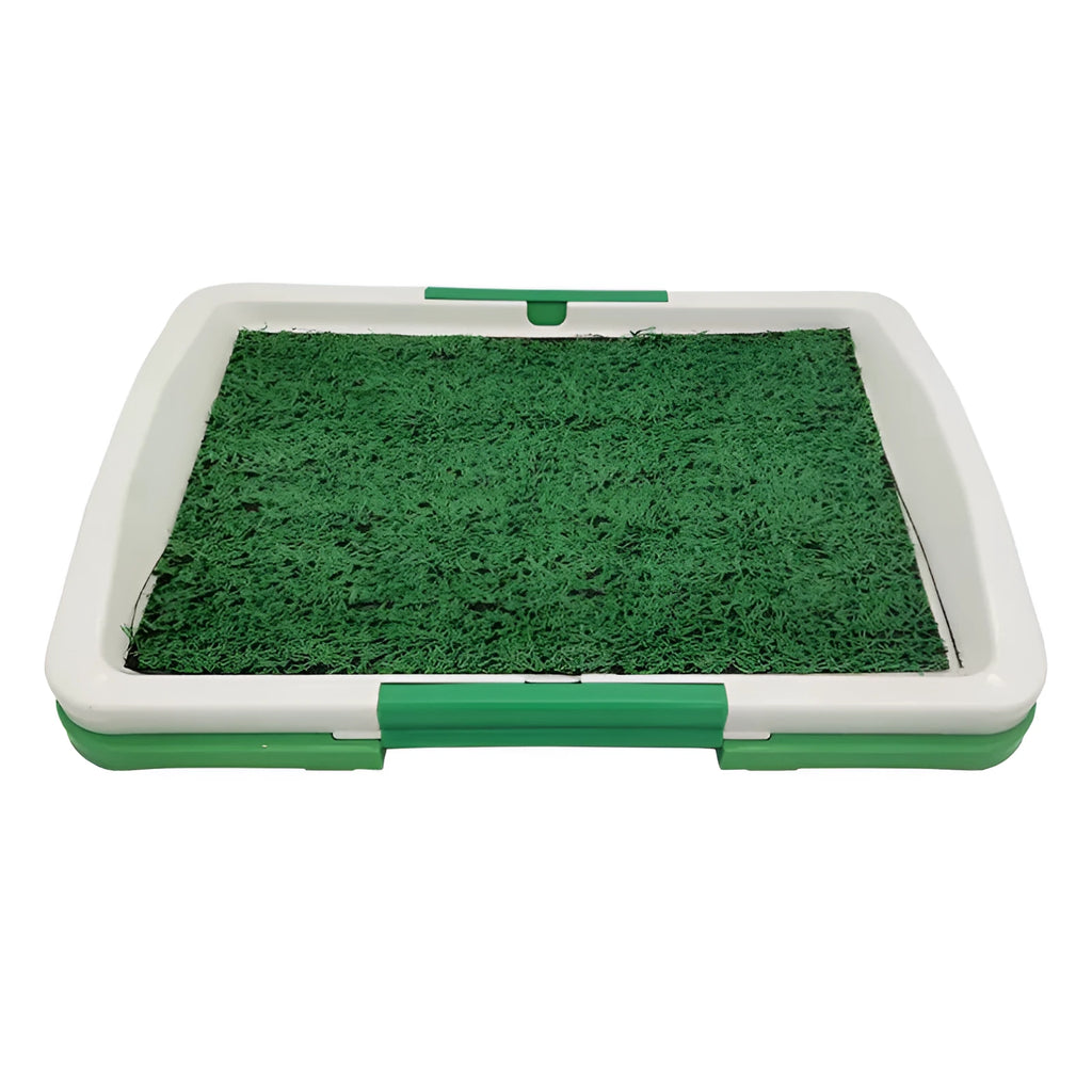 Green artificial grass dog toilet training tray with plastic base and collection basin.