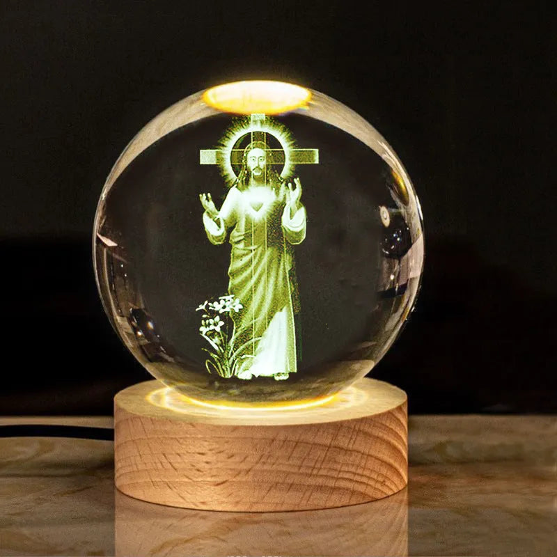 White crystal lamp with 6cm diameter orb on solid wood warm light base showing religious ornamentation