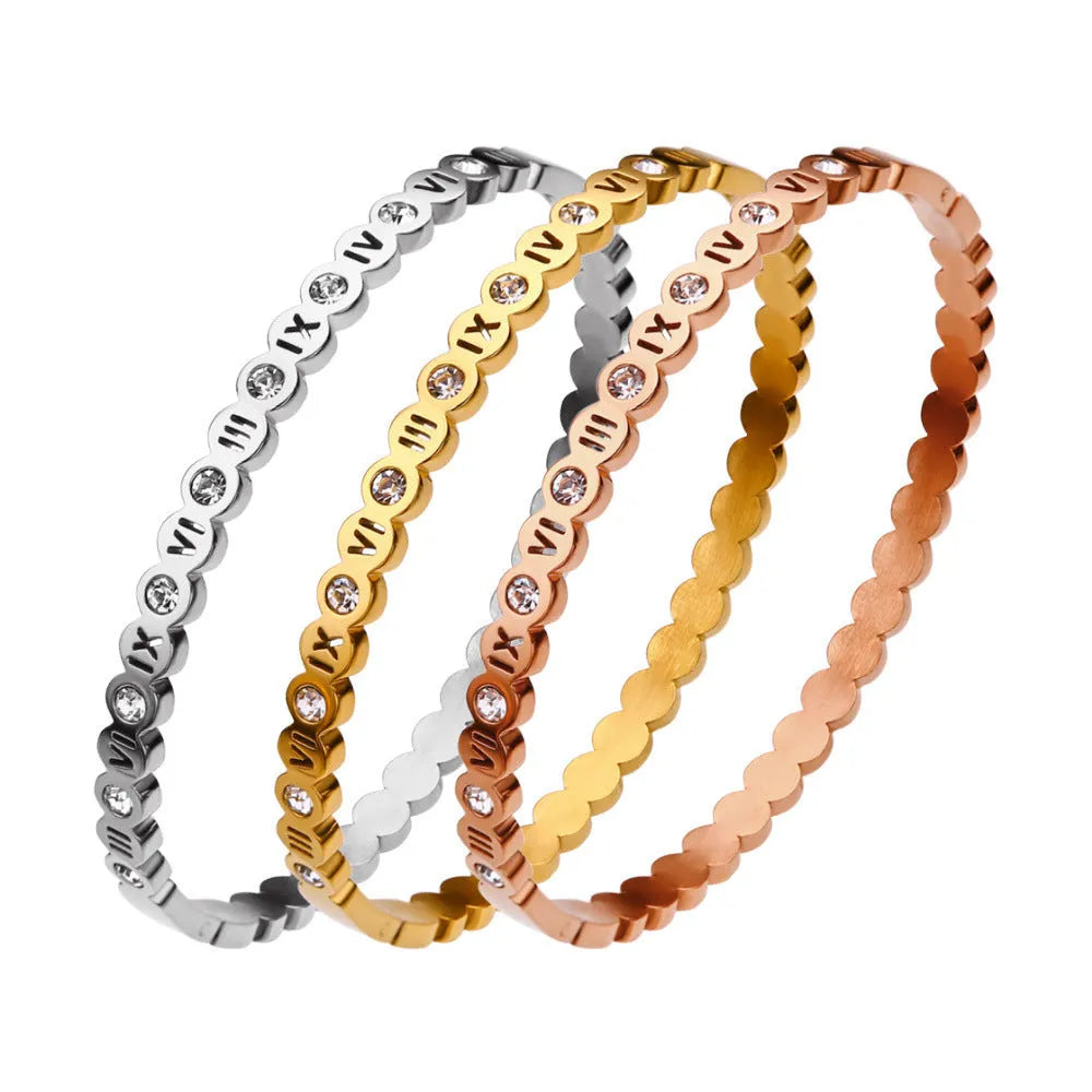 Korean style titanium steel bracelet with number design in gold, rose gold, or steel colour.