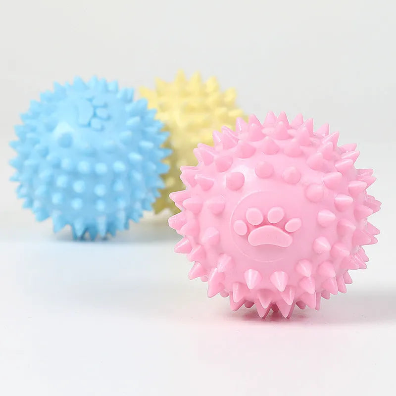 Blue TPR dog chewing toy footprint ball for tooth cleaning, 6cm diameter.