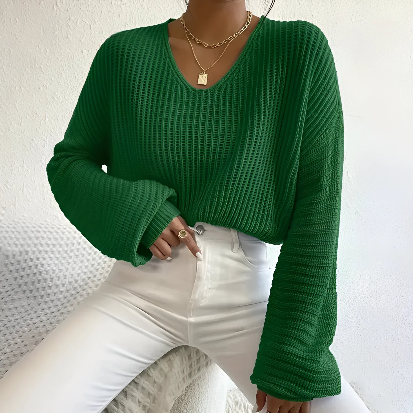 Women's solid color long sleeve pullover top in casual regular fit made of polyester available in multiple colors