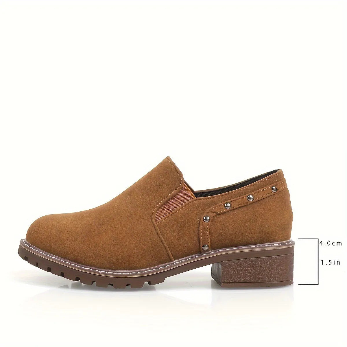 Women's light brown suede ankle boots with a low stout heel and elastic band at the ankle.