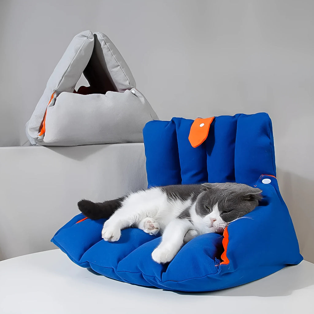 Blue triangular cat bed with drilled holes on the sides for combination, showing removable cotton cover.