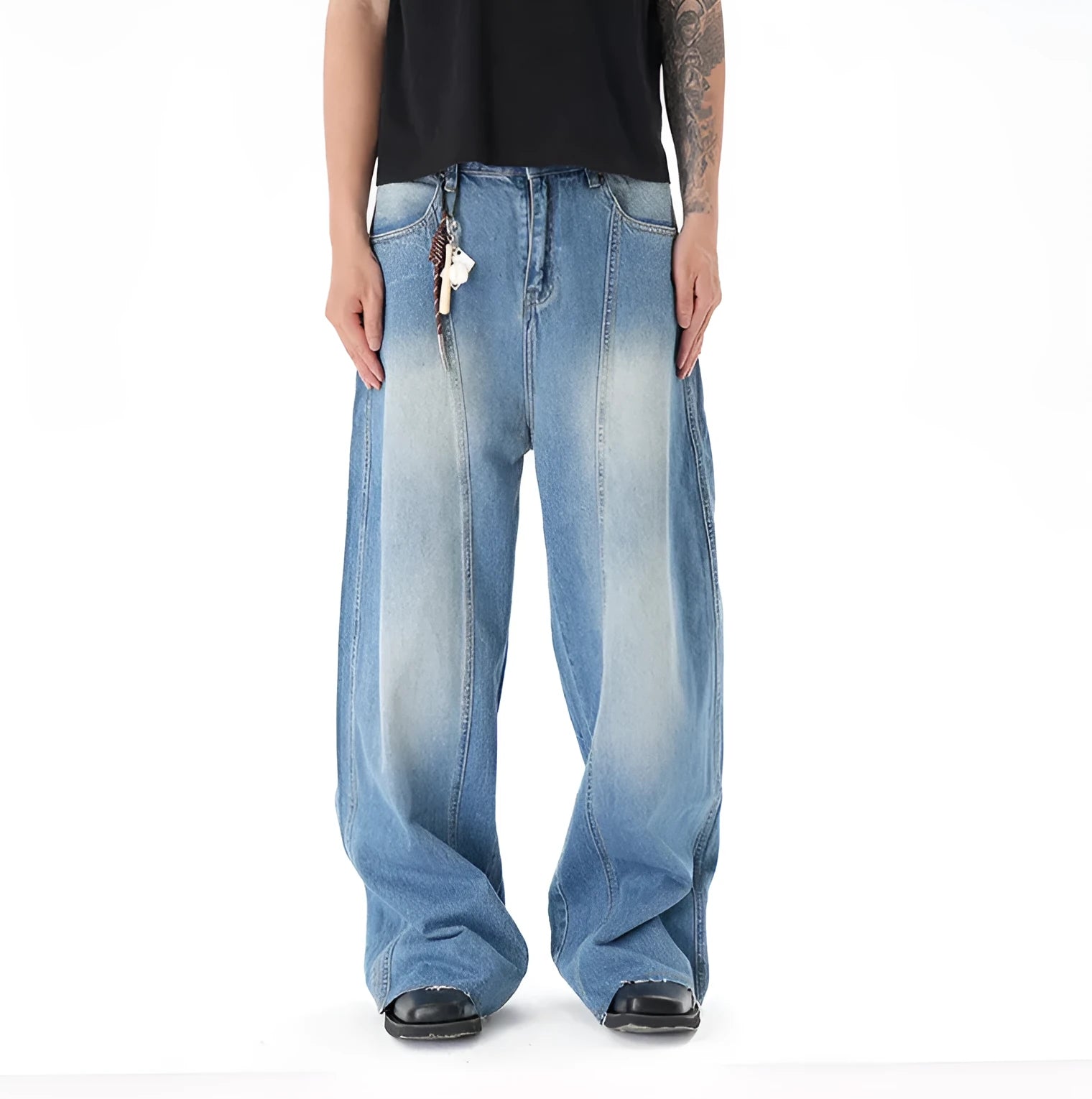 Light blue vintage washed wide leg jeans with zipper closure on mannequin