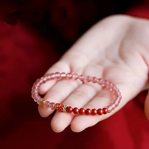 Purple cinnabar and strawberry quartz beaded bracelet with lucky beads and peach blossom motifs