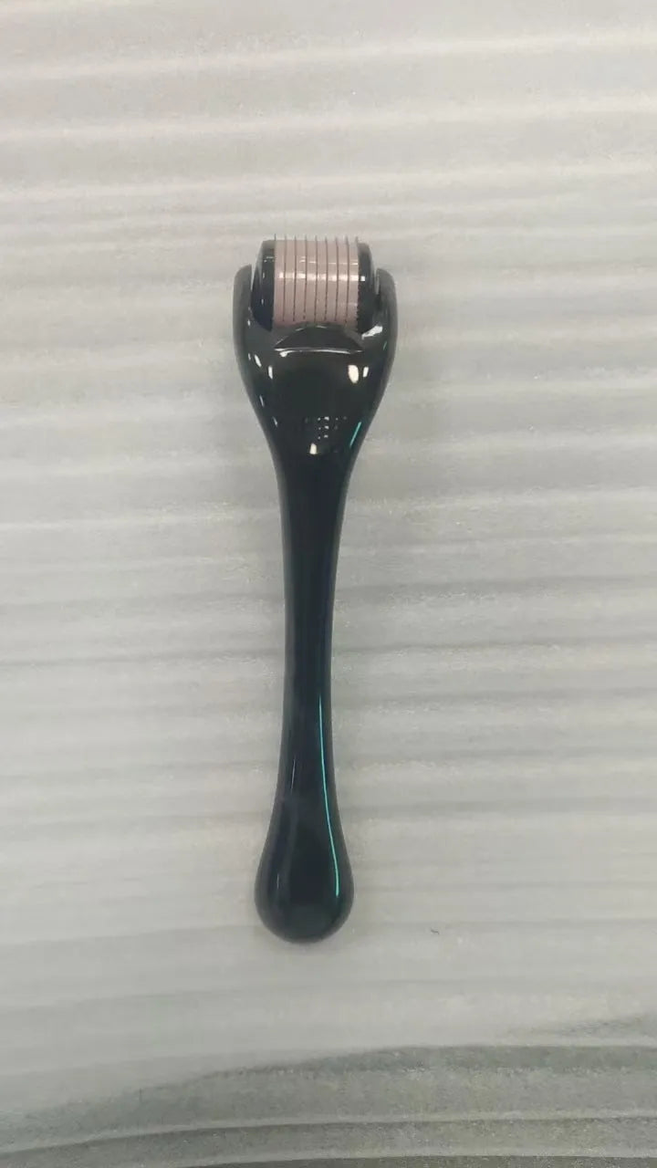 540 needle micro roller dermaroller with black handle and purple wheel, showing needle depth settings.
