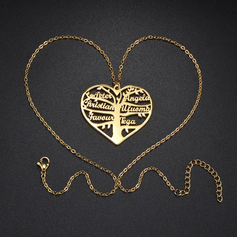 Custom silver necklace with hollow heart and life tree pendant engraved with names on a 50cm chain.