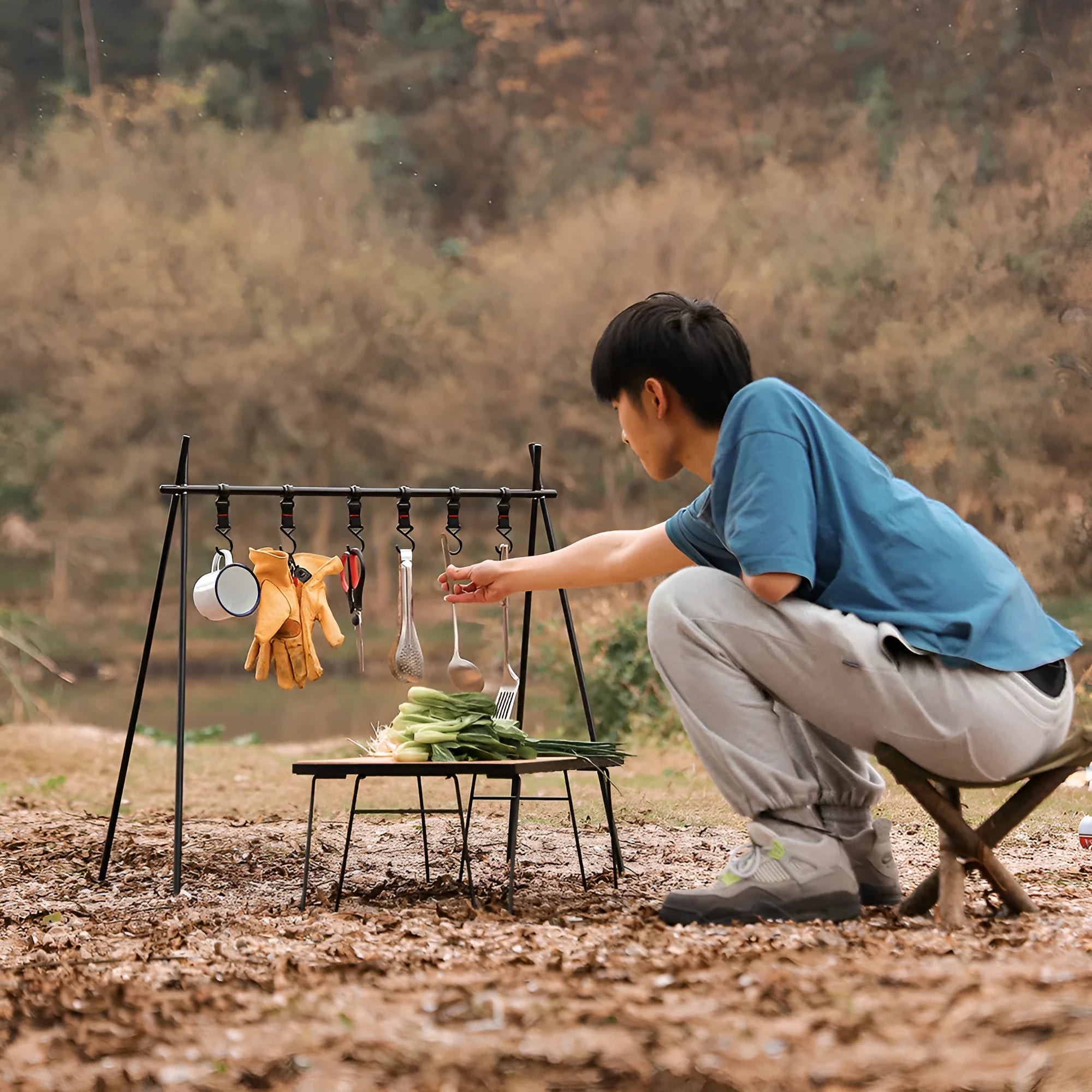 Aluminium alloy foldable camping clothes drying rack with triangular frame and side shelf