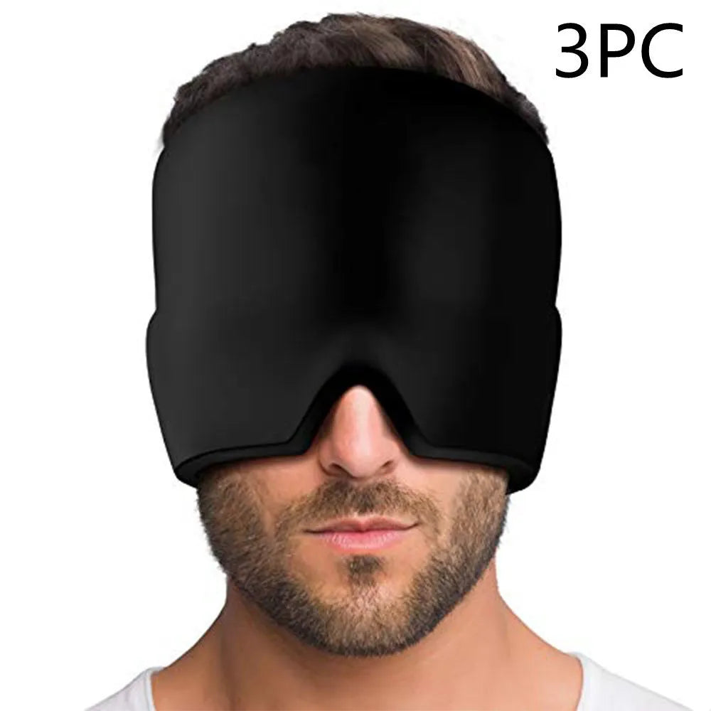 Black elastic cloth gel cold therapy eye mask for headache relief on grey background.