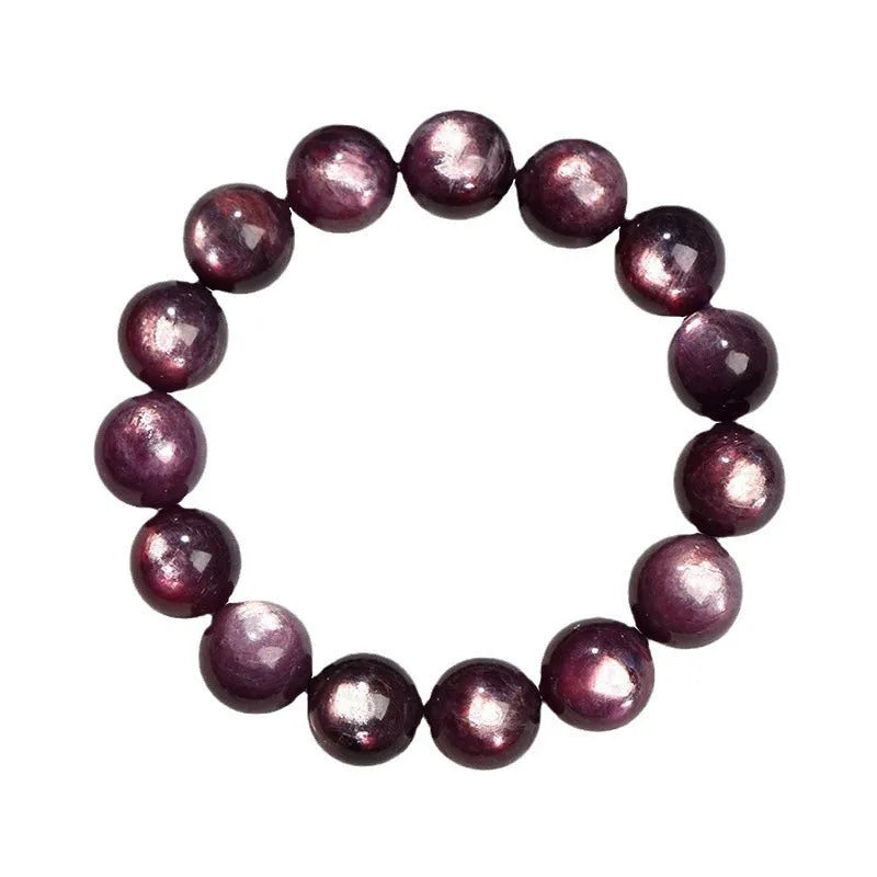Natural purple lepidolite round bead crystal bracelet showing polished beads on a wrist.