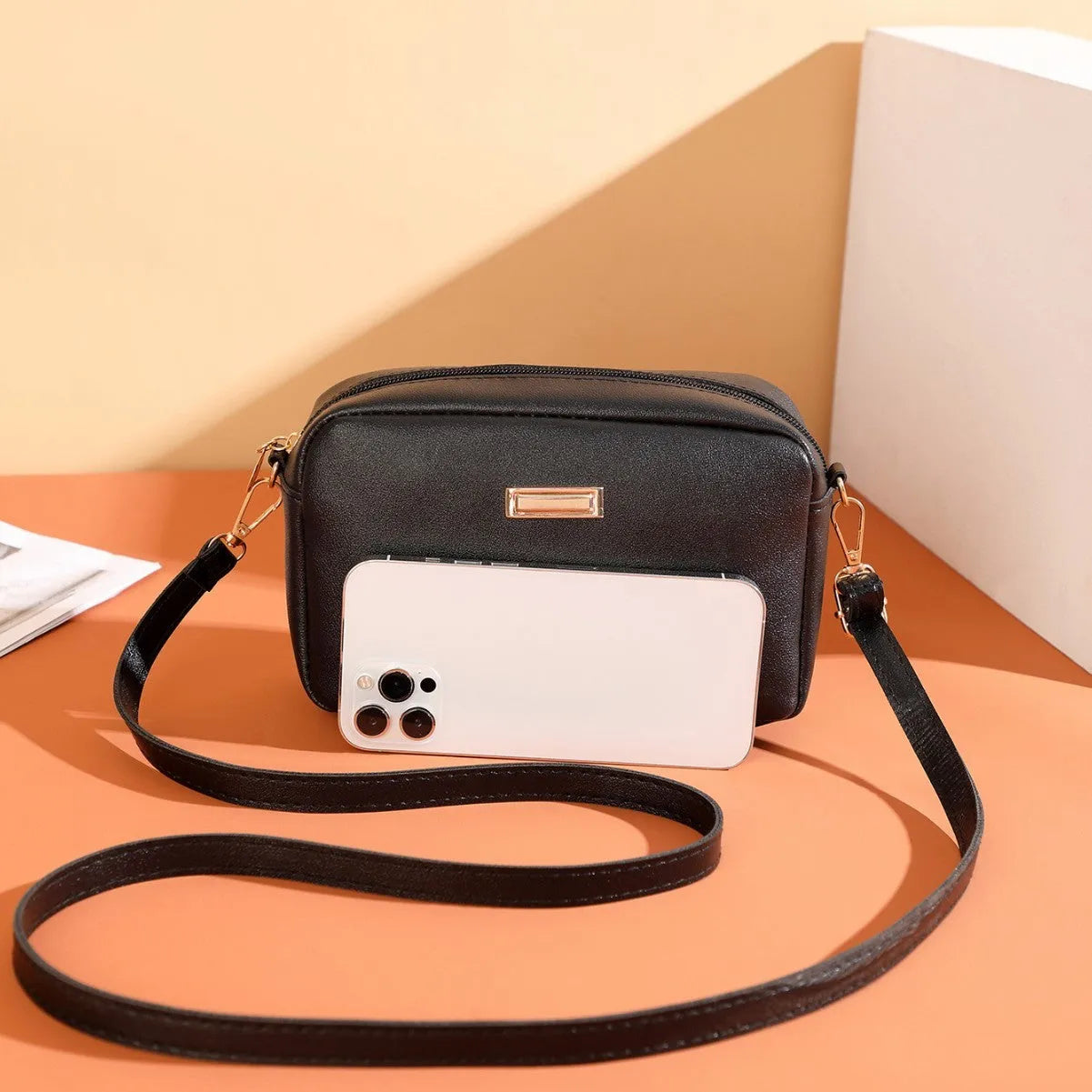 Women's solid colour PU shoulder bag in a horizontal square shape with a three-dimensional pocket.