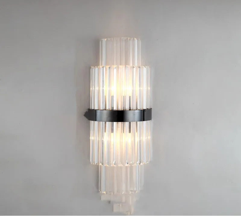 Modern crystal wall lamp with petal design in titanium gold finish