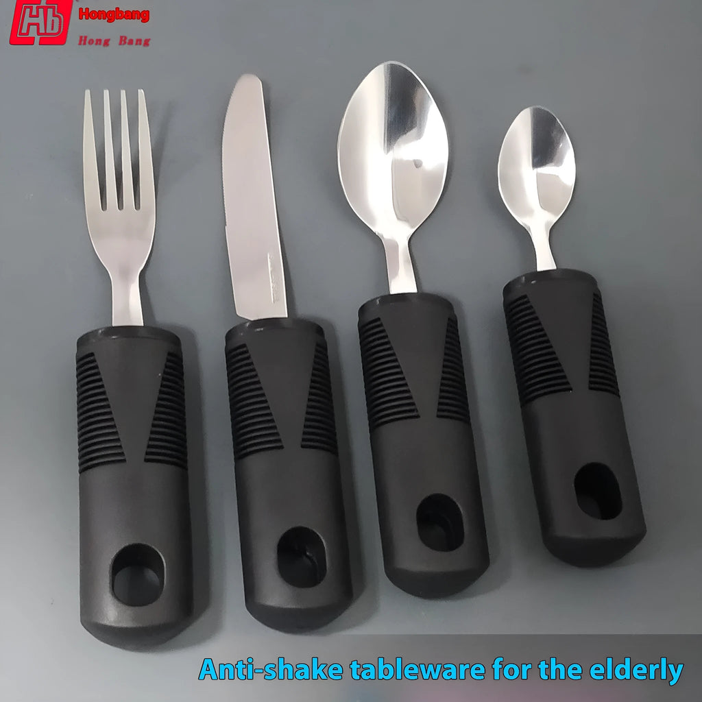 Stainless steel adaptive spoon with black rubber anti-shake handle for elderly food aid.