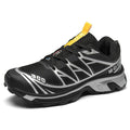 Men's and women's low-top artificial leather hiking shoes in khaki with lace-up front and flat rubber sole