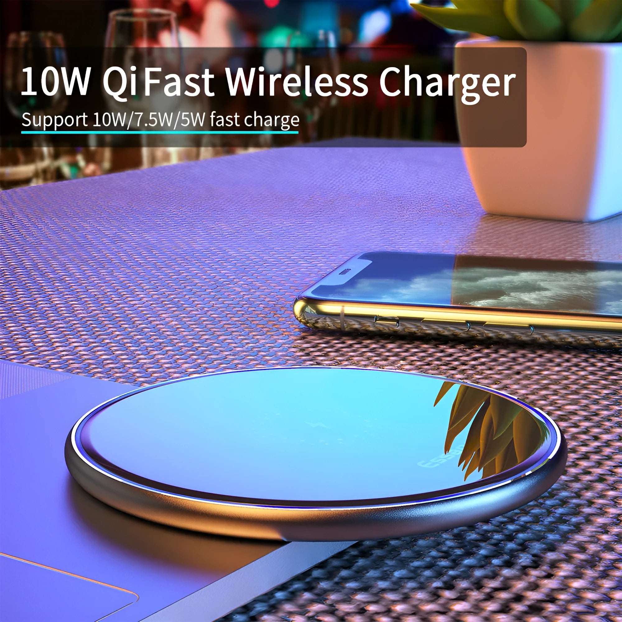 Black 15W fast wireless charging pad with LED indicator light on a desk