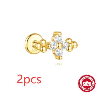 S925 sterling silver geometric star earrings with embedded moon and diamond detail in a gold colour.