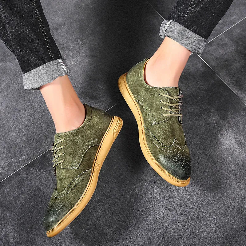 Men's black genuine cowhide leather lace-up business shoes with rubber sole on a grey background.