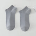 Solid colour low-cut polyester boat socks for men, shown in one of six available colour variants.