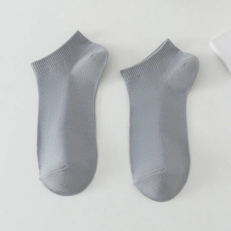 Solid colour low-cut polyester boat socks for men, shown in one of six available colour variants.