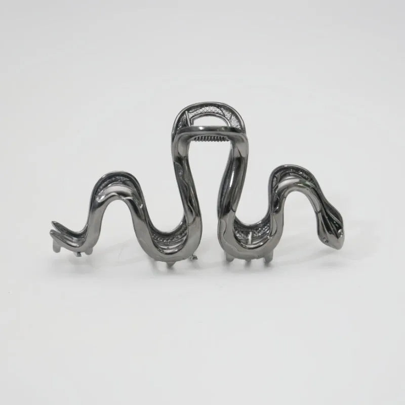 Silver Slytherin serpentine metal hair barrette measuring 10.5 cm in length.