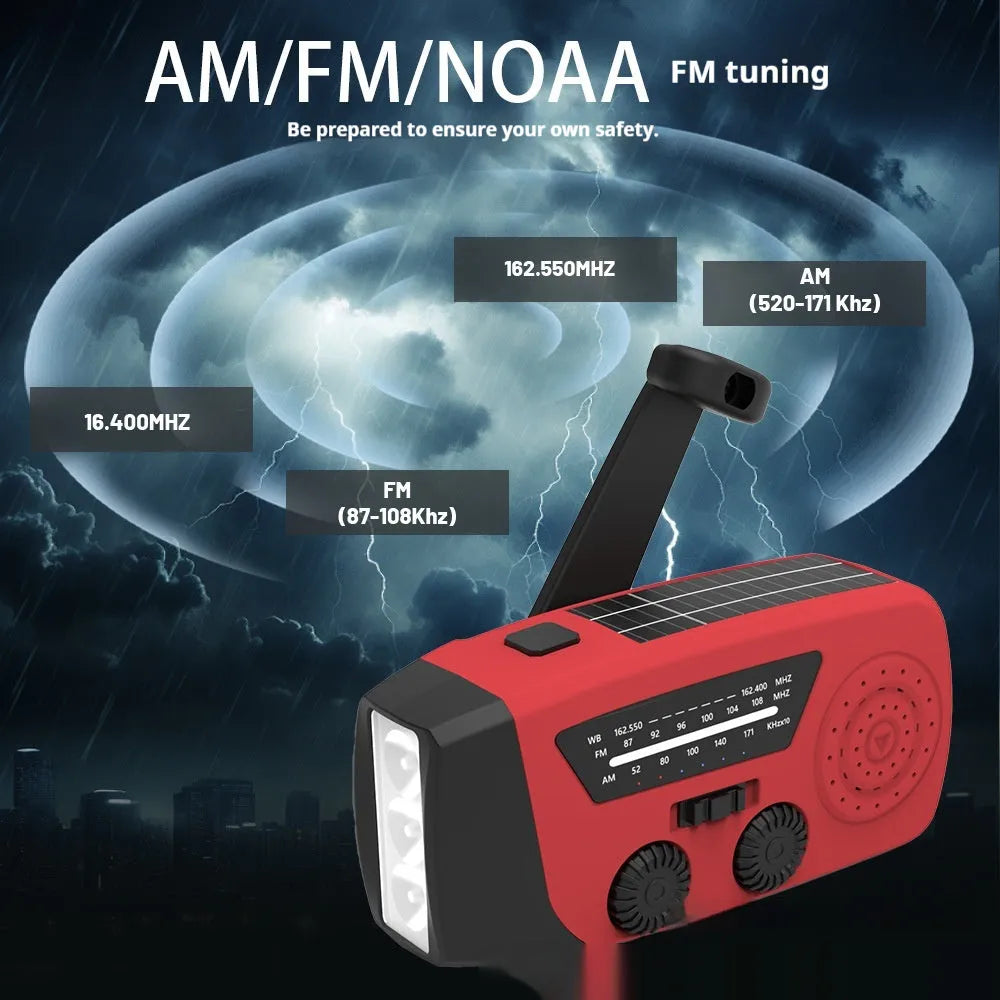 Red hand-crank emergency radio torch with solar panel, LED flashlight, and USB charging port.