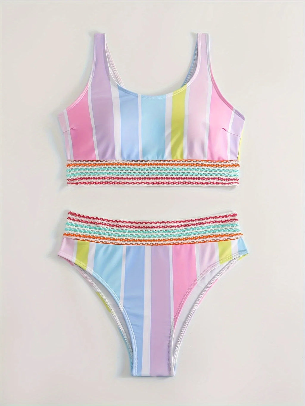Women's striped blue and white sports bikini set on a mannequin