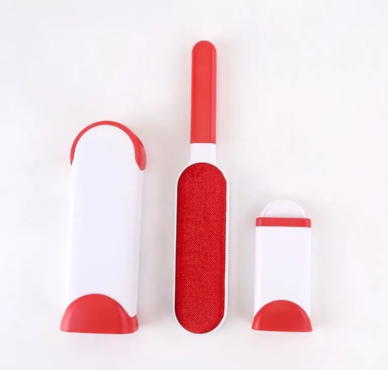 Blue reusable pet hair removal comb with double-sided brush and self-cleaning base for furniture.
