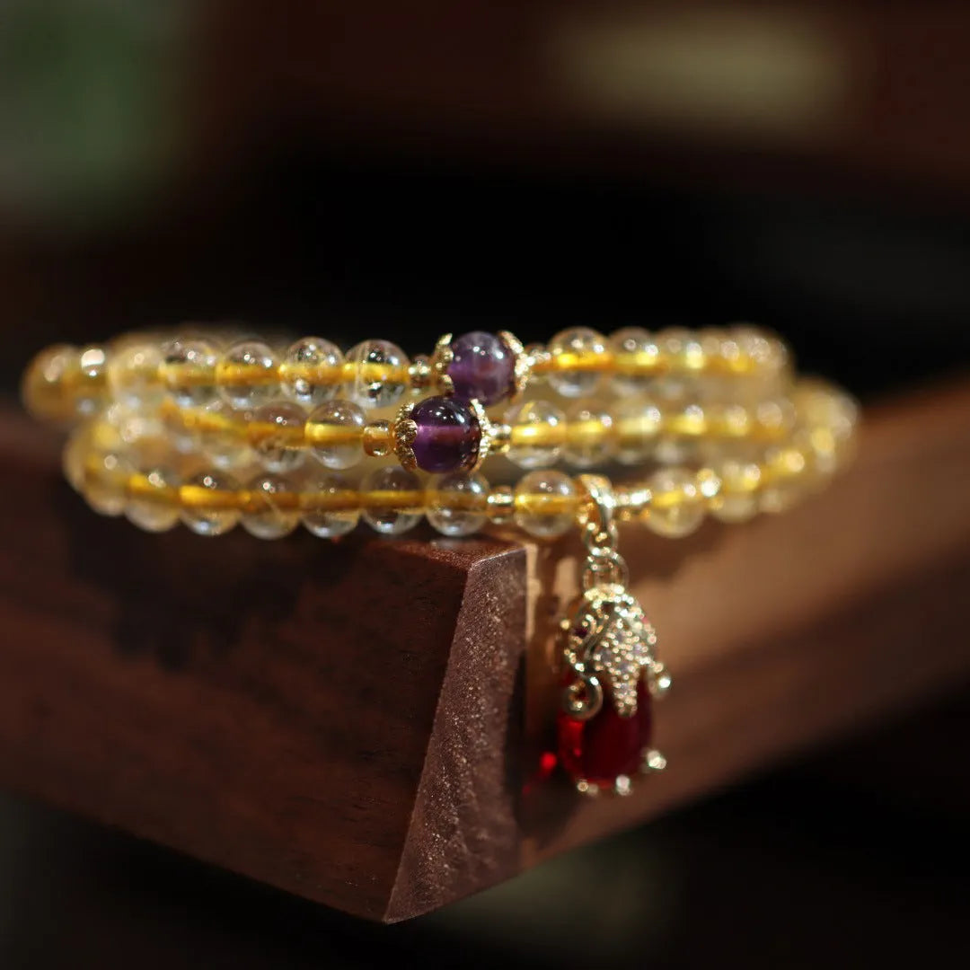Natural Brazil gold rutilated quartz bracelet with Chinese style design and hanging chopsticks