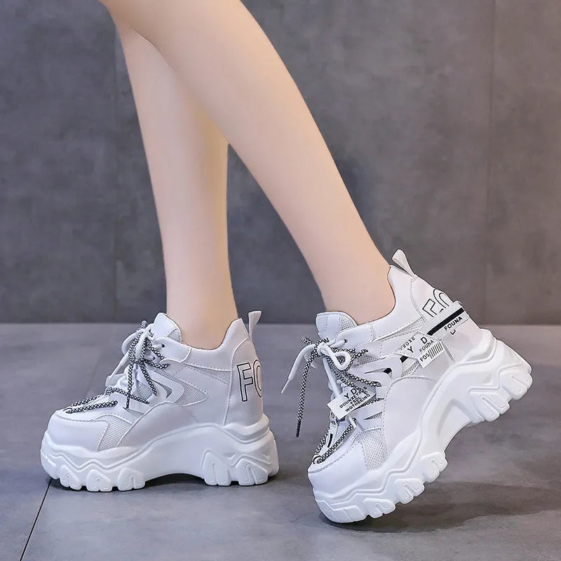 White women's platform tennis shoes with mesh upper and cross strap design