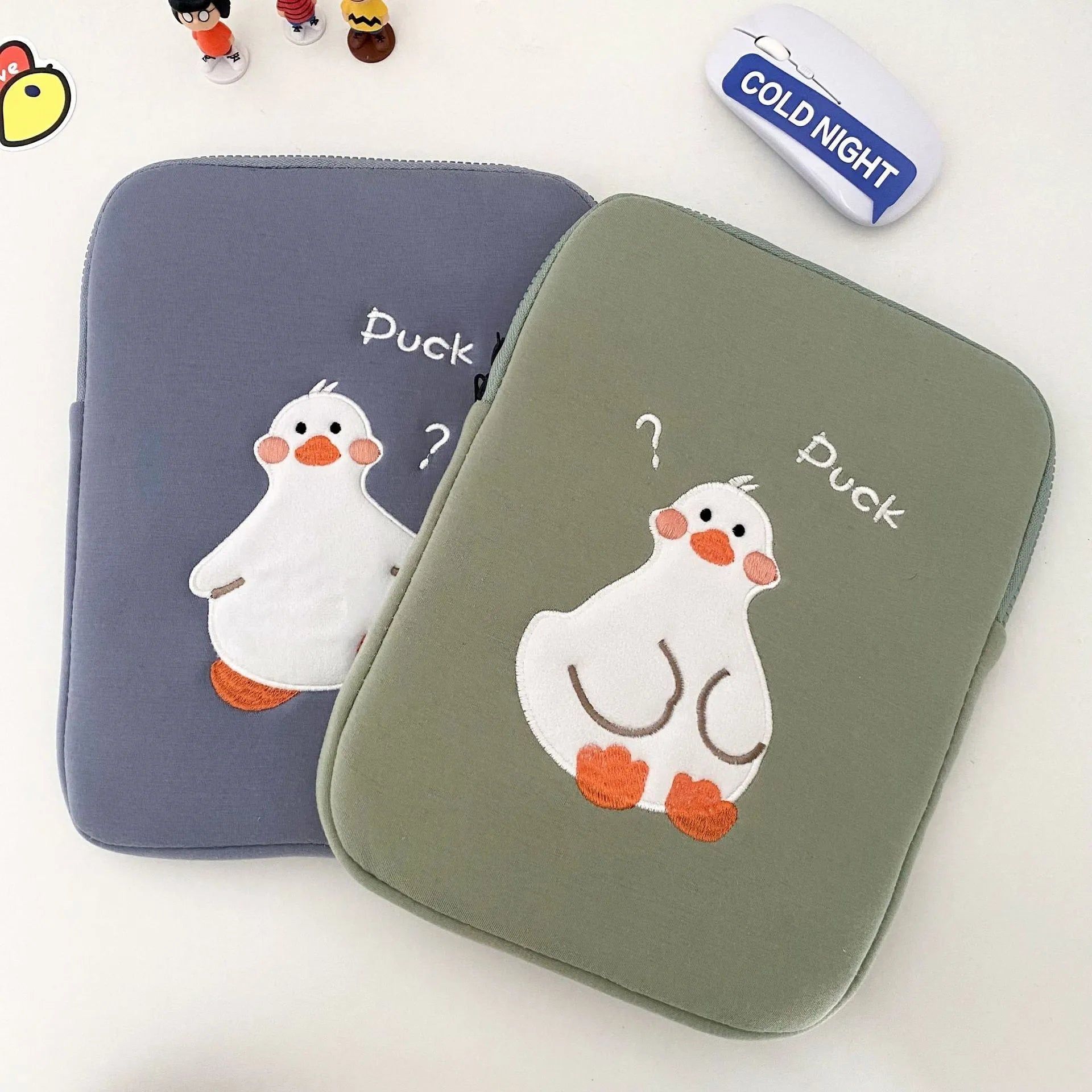 Cotton tablet case with embroidered cartoon duck design and zipper closure