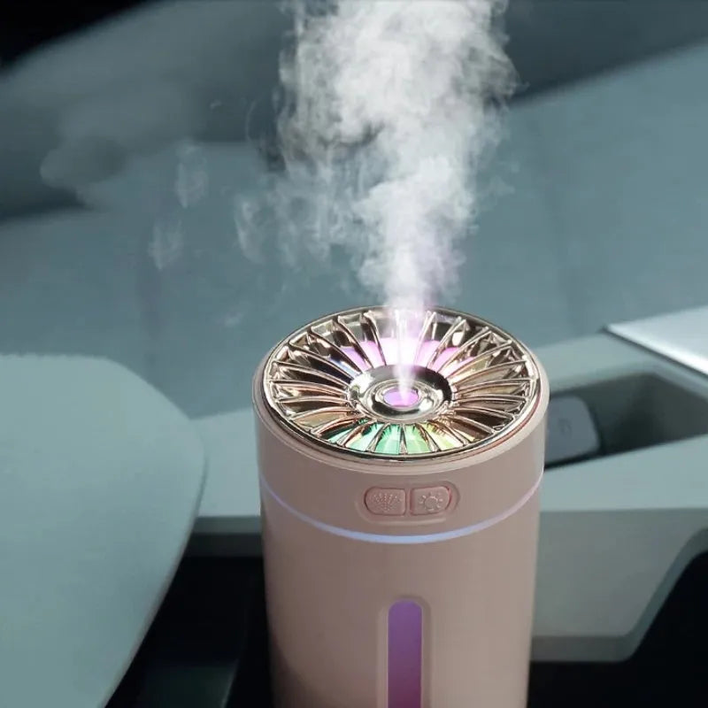 Black portable USB rechargeable humidifier with colourful LED lights and compact design for car or desktop use