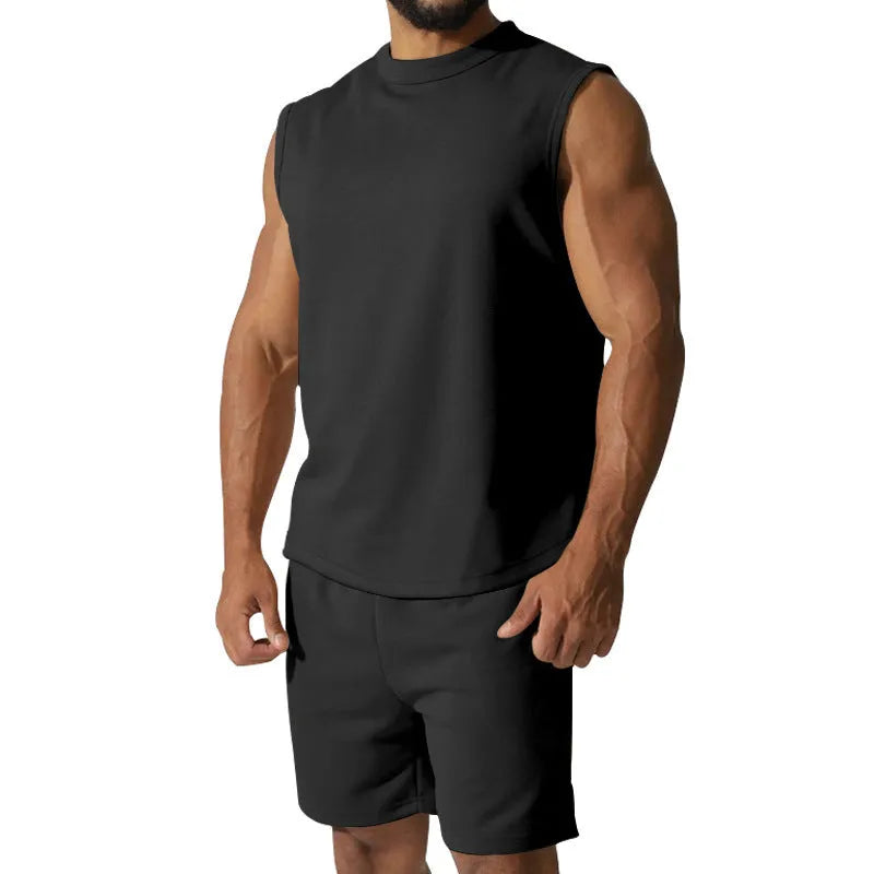 Men's sleeveless cotton blend sports top and matching shorts in a solid colour