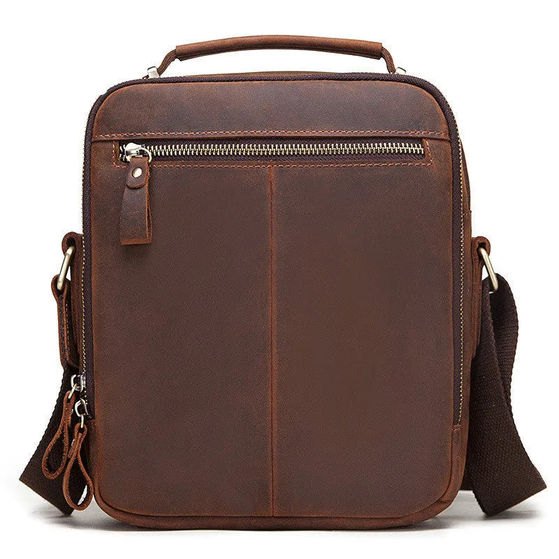 Men's brown crazy horse leather crossbody bag with sewing line detail and single shoulder strap.